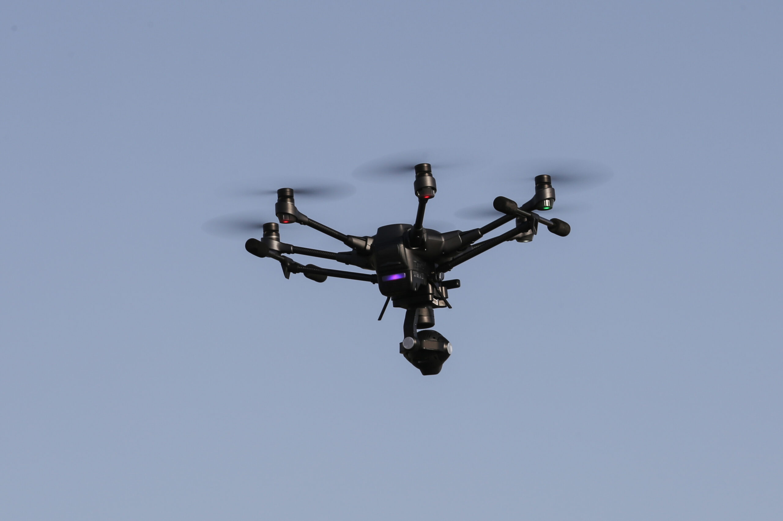 Services black hexacopter helicopter is flying in sky 2025 10 16 03 35 54 utc